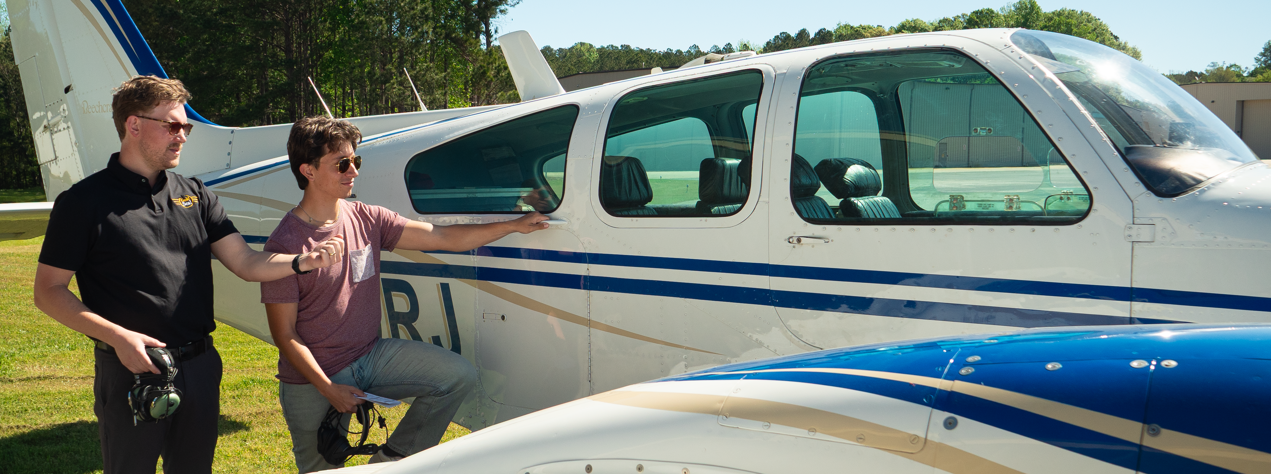 Instructor and Pilot during pre-flight